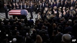 The flag-draped casket of Rep. Elijah Cummings is seen during a memorial service for the late congressman at the Capitol, in Washington, Oct. 24, 2019.