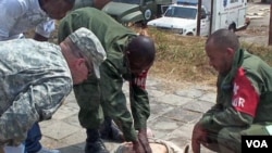 Soldiers from the Congolese army medical personnel train as soldiers from AFRICOM, the US military command covering Africa, oversee them during a two-weelk training exercise in Kinshasa, the capital of the Democratic Republic of Congo, October 2010.