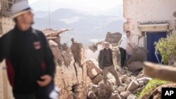 eople inspect their damaged homes after an earthquake in Moulay Brahim village, near Marrakech, Morocco, Saturday, Sept. 9, 2023.