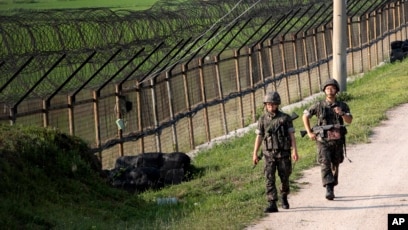 韩国朝鲜星期天在军事分界线附近交火