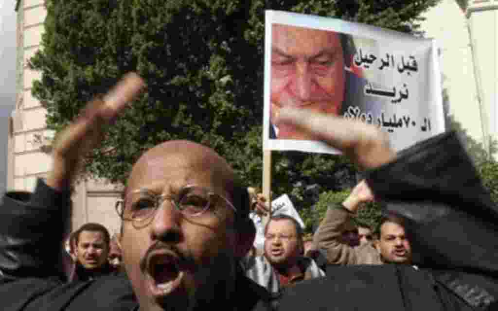 An Egyptian lawyer shouts anti-Mubarak slogans as lawyers streamed into Cairo's Tahrir Square, Thursday, Feb. 10, 2011. Labor unrest across the country gave powerful momentum to Egypt's wave of anti-government protests. With its efforts to manage the cris