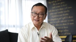 Self-exiled Cambodian opposition party founder Sam Rainsy speaks during an interview with Reuters at a hotel in Kuala Lumpur, Malaysia, November 10, 2019. REUTERS/Lim Huey Teng