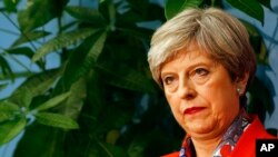 Britain's Prime Minister Theresa May, the day after general election in Maidenhead, England, Friday, June 9, 2017. (AP Photo/Alastair Grant)