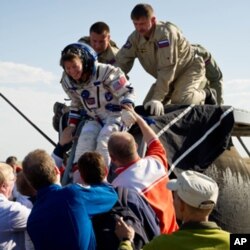 Simpson's wife, astronaut Cady Coleman, after returning from the International Space Station in May 2011.