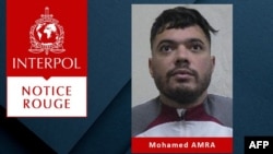 FILES - This undated handout Red Notice (Notice Rouge) image released by Interpol on May 15, 2024, shows Mohamed Amra, a French fugitive known as “The Fly,” who was arrested in Romania on Feb. 22, 2025. 