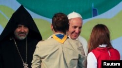 Pope Francis greets faithful after a Prayer for Peace with leaders of various religious confessions, in Sofia, Bulgaria, May 6, 2019. 