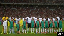 ARCHIVES - L'équipe de l'Ouganda lors d'un marche pour les qualificatifs de la Coupe du monde 2018 au stade d'Alexandria, le 5 septembre 2017.