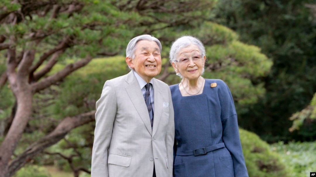 In this photo provided by the Imperial Household Agency of Japan, its Emperor Emeritus Akihito and Empress Emerita Michiko pose for a photograph in Tokyo, Oct. 4, 2024.