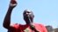 FILE - Leader of the Economic Freedom Fighters (EFF) Julius Malema addresses supporters in Pretoria, South Africa, on March 20, 2023. 