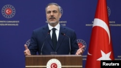 FILE - Turkish Foreign Minister Hakan Fidan speaks during a press conference in Ankara, Turkey, on Feb. 24, 2025. Fidan's recent criticism of Iranian support for militias in the Middle East triggered diplomatic discussions with the countries' ambassadors.