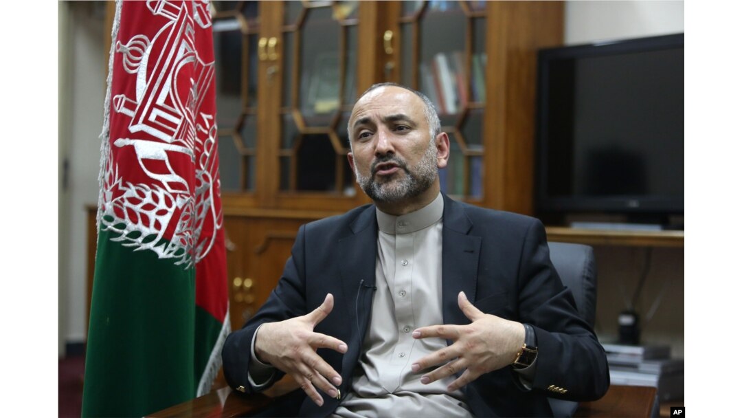 FILE - Afghan National Security Adviser Mohammad Hanif Atmar speaks during an interview with The Associated Press, in Kabul, Afghanistan.