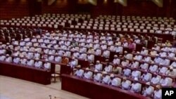 A still image taken from video shows the inaugural session of the Burma parliament in Naypyitaw, February 1, 2011. The first session of an elected parliament in half a century opened with hundreds of lawmakers headed into the vast compound that was built 