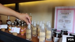 120ml-bottles of hand sanitizers produced by Samai Distillery​ are on display at its shop in Phnom Penh, Cambodia, March 31, 2020. (Phorn Bopha /VOA Khmer) 