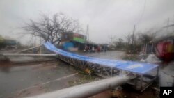 Damaged signage lies on a street in Puri district after Cyclone Fani hit the coastal eastern state of Odisha, India, May 3, 2019. 