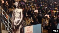 FILE: War veterans with President Robert Mugabe at the City Sports Center recently to express their solidarity with the 92 year-old Zimbabwean leader. 