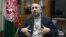 FILE - Afghan National Security Adviser Mohammad Hanif Atmar speaks during an interview with The Associated Press, in Kabul, Afghanistan.