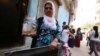 Fatma Oren’s family did not forget to take their goldfish when they were among those forced to leave Sur’s Ali Pasa neighborhood, which was among several that were damaged in clashes. Many don’t want to leave and say the government compensation is too little. (M. Bozarslan/VOA)