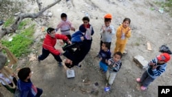 Syrian refugee children at play in Sidon, Lebanon.