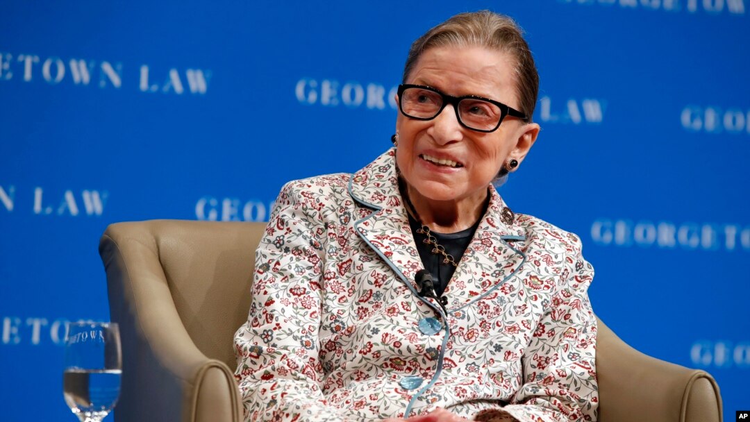 FILE - Supreme Court Justice Ruth Bader Ginsburg smiles as she takes questions from first-year students at Georgetown Law, Sept. 26, 2018, in Washington.