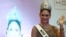 FILE - Miss Universe 2015 Pia Wurtzbach waves during a news conference at a hotel in Quezon city, metro Manila, Jan. 24, 2016, after her return to the Philippines.  