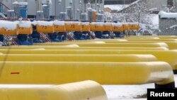 FILE - Pipes are seen at a gas compressor station in the village of Boyarka, outside Kyiv, Ukraine, Dec. 19, 2012. 