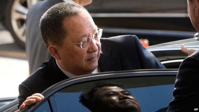 FILE - North Korean Foreign Minister Ri Yong Ho gets into a car at Beijing Capital International Airport in Beijing, China, Sept. 19, 2017.