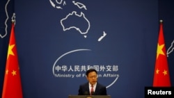 Chinese Foreign Ministry spokesman Zhao Lijian speaks during a news conference in Beijing, April 8, 2020.