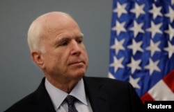 FILE - U.S. Senator John McCain attends a news conference in Mexico City, Mexico, Dec. 20, 2016.