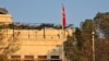 Turkey's flag hangs outside the Turkish Embassy in Damascus, Syria, on Dec. 14, 2024. Iranian officials say that in his final days in power, Syrian President Bashar al-Assad told Iran's foreign minister that Turkey was helping rebel factions seeking to topple him.