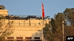 Turkey's flag hangs outside the Turkish Embassy in Damascus, Syria, on Dec. 14, 2024. Iranian officials say that in his final days in power, Syrian President Bashar al-Assad told Iran's foreign minister that Turkey was helping rebel factions seeking to topple him.