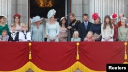 Britain's Prince Harry and Meghan, Duchess of Sussex, along with other members of the British royal family, on the balcony of Buckingham Palace as part of Trooping the Color parade in central London, Britain, June 9, 2018.
