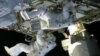 Astronauts Perform Emergency Space Walk To Fix Leak