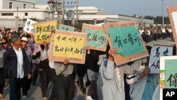 Protesters march during one of their rallies in Wukan village (file photo)