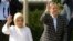 Turkey's Prime Minister Tayyip Erdogan waves to his supporters next to his wife Emine Erdogan in Ankara, June 9, 2013. 