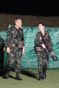 Thailand's King Maha Vajiralongkorn and General Sineenat Wongvajirapakdi, the royal noble consort are pictured in this undated handout photo obtained by Reuters August 27, 2019. Royal Household Bureau/Handout via REUTERS ATTENTION EDITORS - THIS…