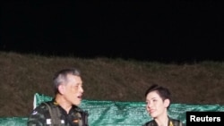 Thailand's King Maha Vajiralongkorn and General Sineenat Wongvajirapakdi, the royal noble consort are pictured in this undated handout photo obtained by Reuters, Aug. 27, 2019.