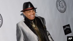 Joe Jackson assiste à un gala à l'hôtel Waldorf-Astoria à New York, le 7 octobre 2014, 