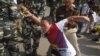 At a demonstration in front of the Chinese Embassy in New Delhi, police arrested 150 Tibetan youth activists marking the 58th anniversary of China’s presence in Tibet, March 10, 2017. (T. Wangyal/VOA)