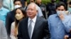 Mantan Perdana Menteri Malaysia Najib Razak meninggalkan Pengadilan Federal di Putrajaya, Malaysia, 23 Agustus 2022. (Foto: REUTERS/Lai Seng Sin)