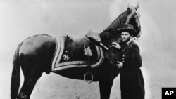 Gen. Ulysses S. Grant, commander of the Union Army during the American Civil War, poses with his horse in this undated photo at an unknown location. (AP Photo)