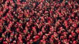 About 50,000 workers take part on a rally in Jakarta, Indonesia, demanding wage increases and to abolish the outsourcing system. 