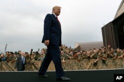 FILE - President Donald Trump arrives to speak to troops at Osan Air Base in South Korea, June 30, 2019.