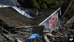 Rumah yang hancur karena tanah longsor di dekat Oso, Washington (23/3).