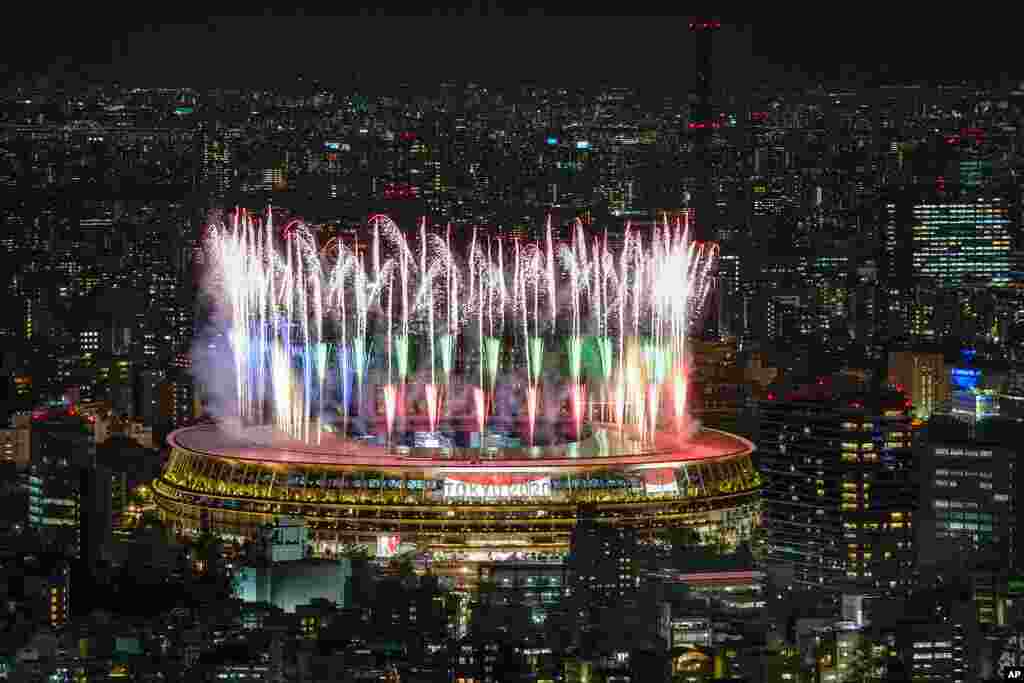 Fireworks illuminate over National Stadium viewed from Shibuya Sky observation deck during the Opening Ceremony for the 2020 Paralympics in Tokyo.