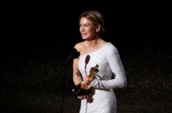 Renee Zellweger accepts the Oscar for Best Actress for "Judy" at the 92nd Academy Awards in Los Angeles, Calif., Feb. 9, 2020.