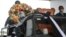The body of Saman Gunan, a former Thai navy SEAL who died during a mission, is carried during a repatriation and religious rites ceremony at Chiang Rai Airport in Mae Sai, Chiang Rai province, in Thailand, July 6, 2018.