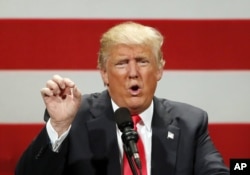 Republican presidential candidate Donald Trump speaks at a rally at the Milwaukee Theatre, in Milwaukee, April 4, 2016.