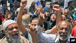 Tough economic times spark a demonstration in Cairo shortly after the Arab Spring began in 2011 and as the IMF agreed to provide Egypt with $3 billion to deal with the hard times.. 