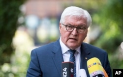 German President Frank-Walter Steinmeier speaks about the attack in Machester, Britain, the day after a suicide bomber attacked an Ariana Grande concert as it ended, in Berlin, May 23, 2017.