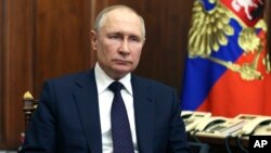 Rais wa Russia Vladimir Putin ambaye mahakama ya ICC inataka akamatwe kwa uhalifu wa vita nchini Ukraine